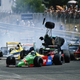Illustration for article titled High Resolution Images Show One Of Formula 1s Most Dramatic (And Non-Lethal) Historic Crashes